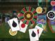 Colorful casino scene with a roulette wheel and playing cards overlaid on bright slot machines in the background.